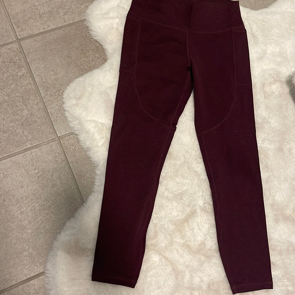 Size small Vuori leggings. Burgundy. Worn maybe once.